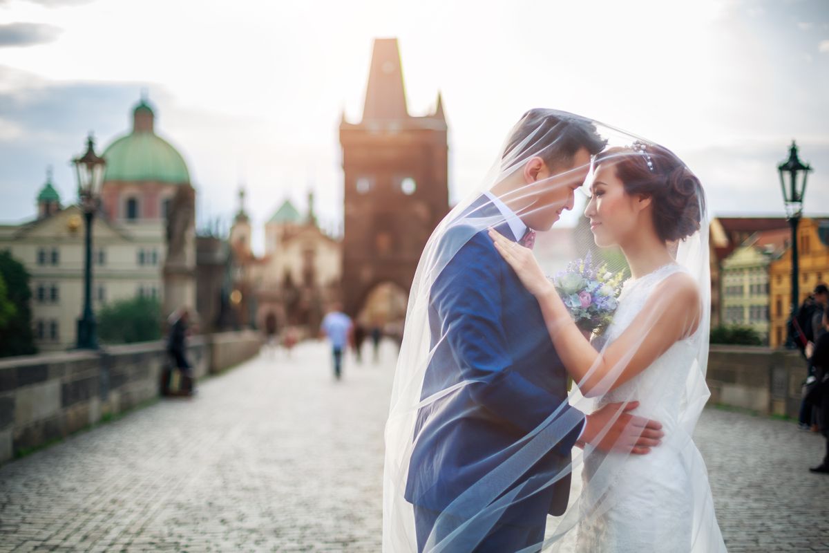 Couple from China in Prague Charles Bridge